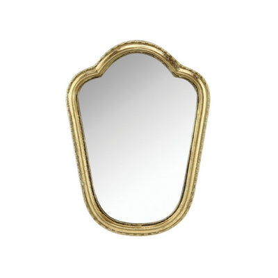 Mini miroir arrondi doré devant un fond blanc 