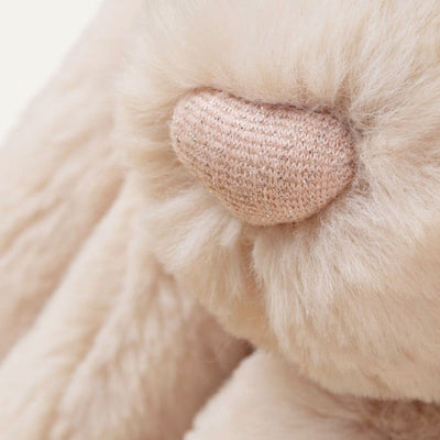 Peluche lapin rose - Collection Luxe vu de près