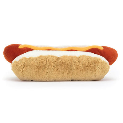peluche hot dog devant un fond blanc