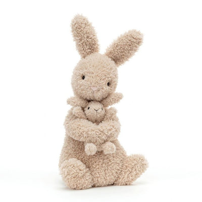 Peluche lapin câlin sur fond blanc