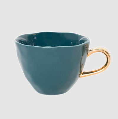 Tasse bleu vert à poignée dorée